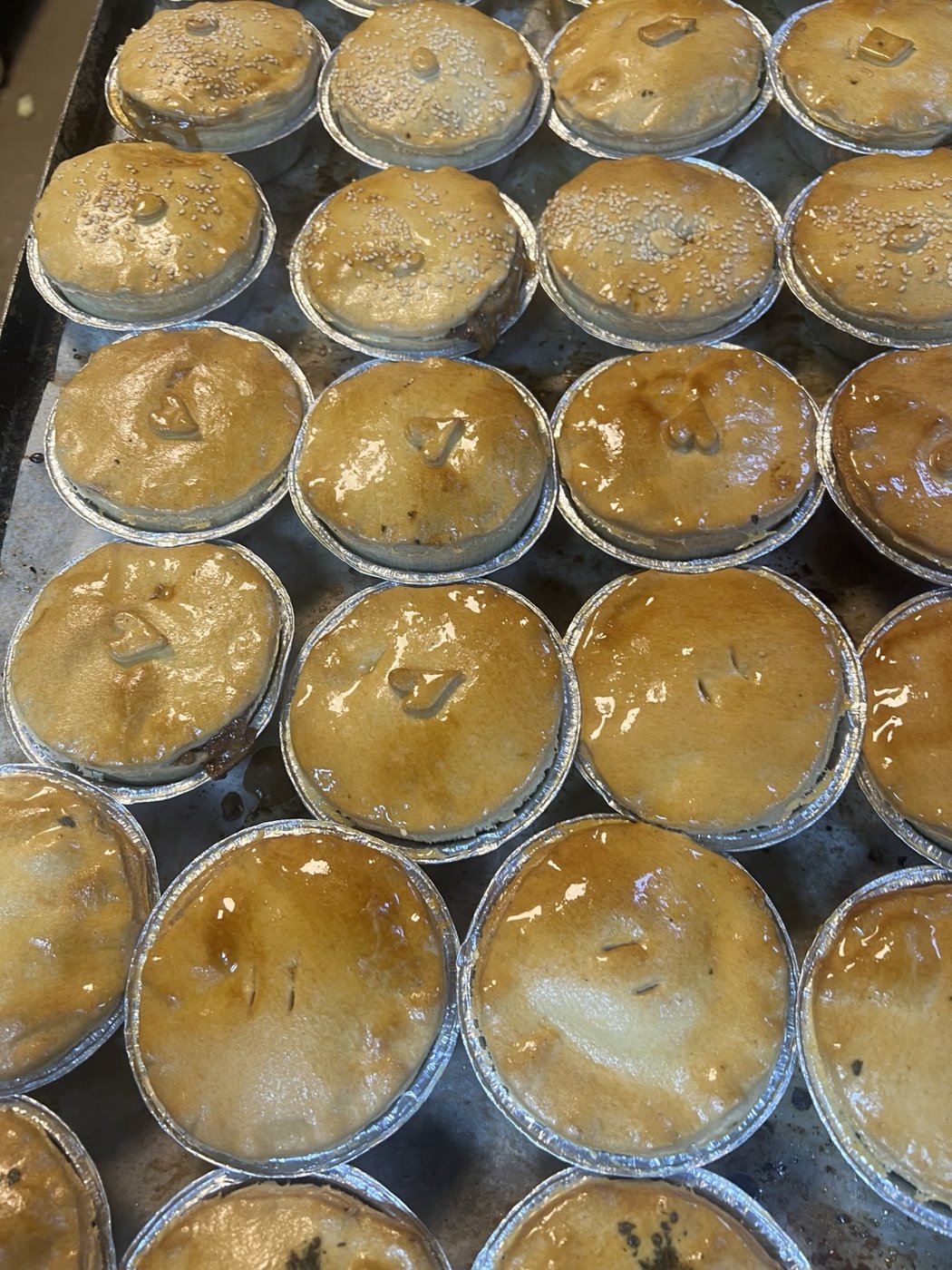 Pies being prepared in the bakery